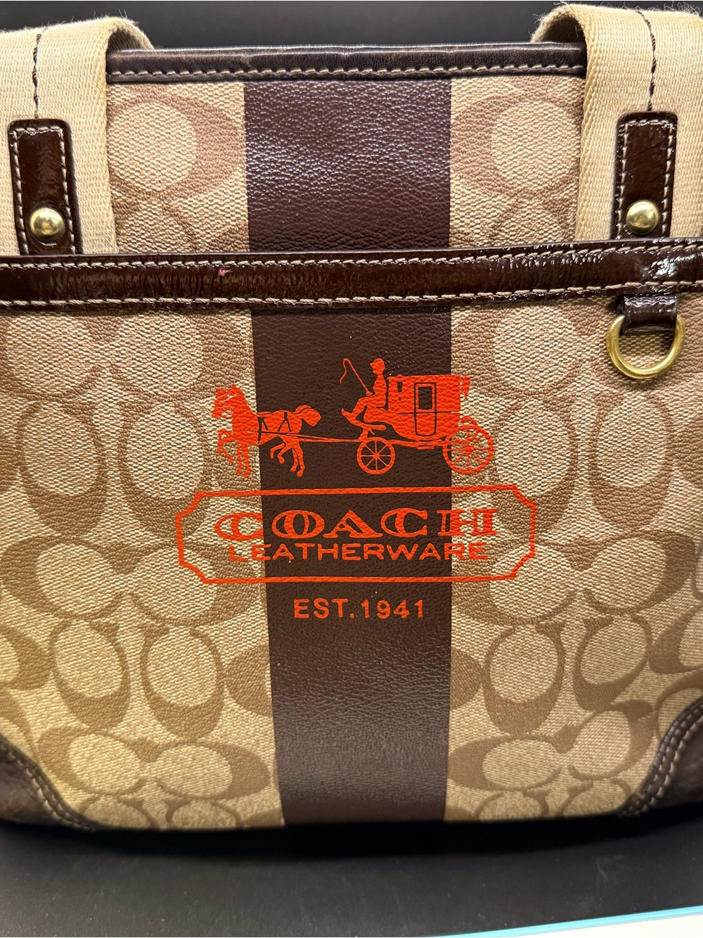 Coach Brown Signature Canvas Shoulder Bag with Orange Logo